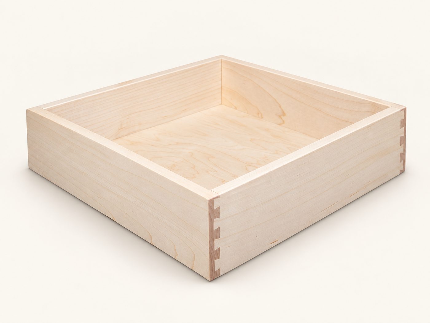 A maple drawer box with dovetailed corners